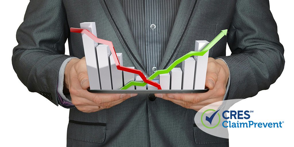 agent holding graph showing slow quarter