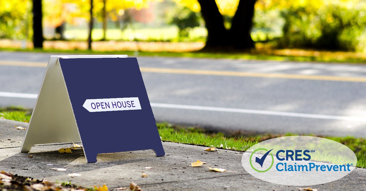 open house sign on sidewalk