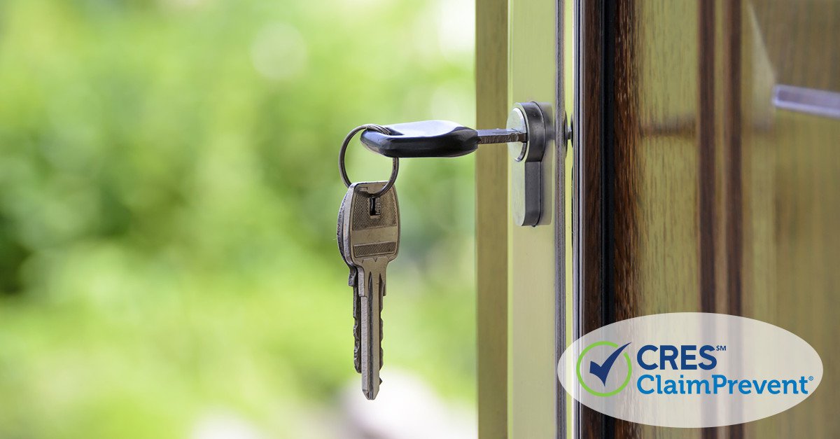 keys in door of house