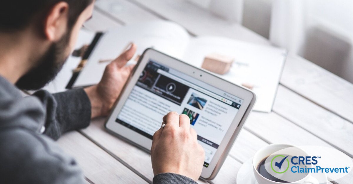 Man reading article on ipad